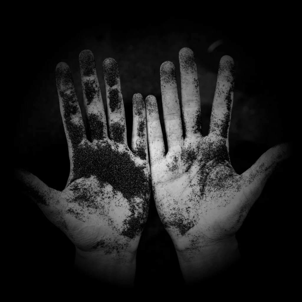 Dramatic black and white image of hands with textured pattern representing hands-on strategic marketing services by Content Crest Media marketing agency in Ahmedabad Gujarat India